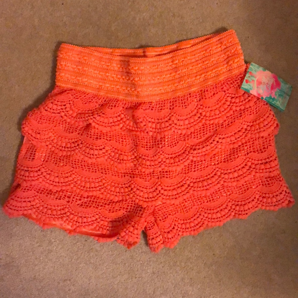 M/L new with tags stylish orange shorts